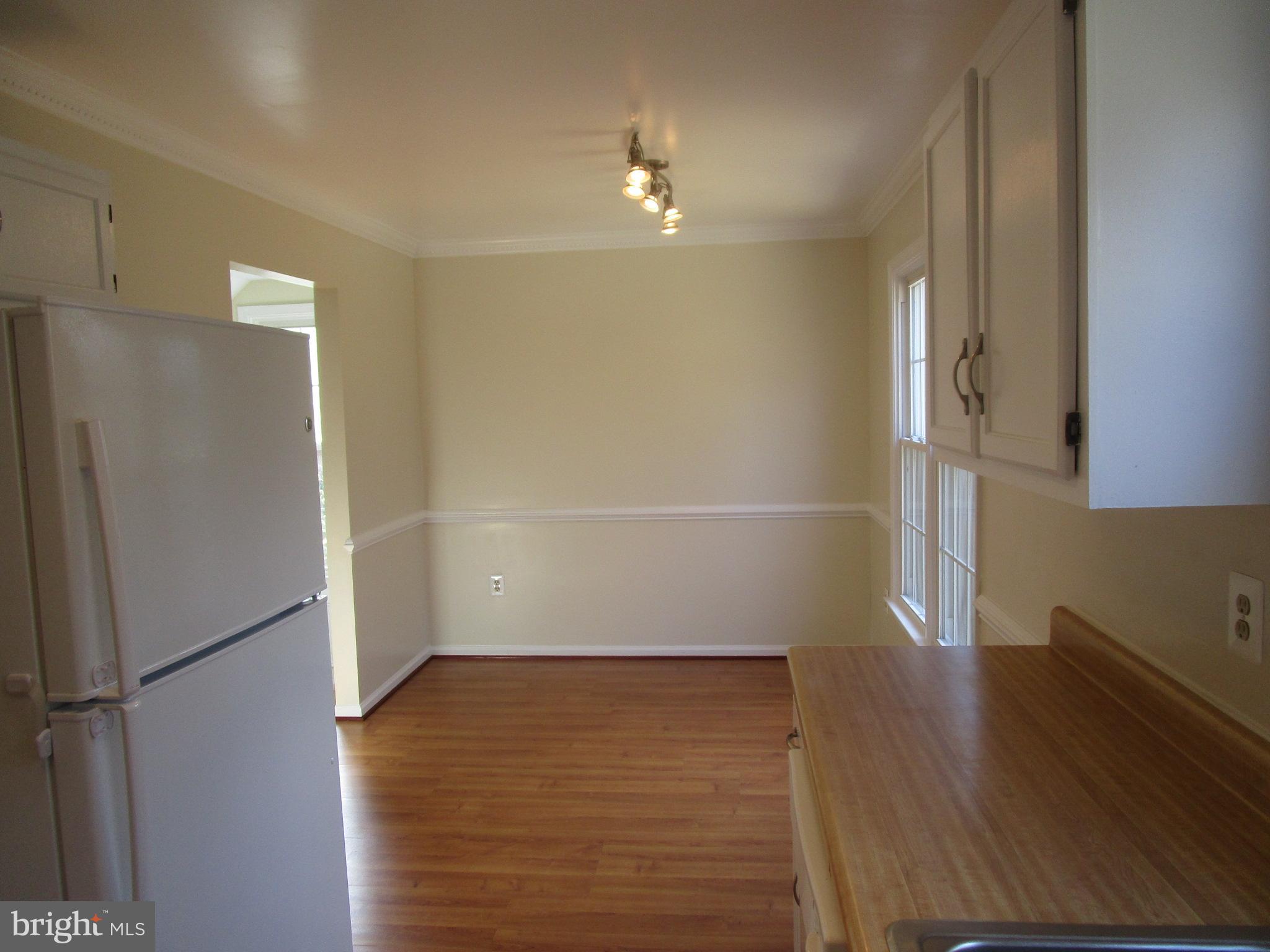7932 Forest Path Way Springfield, VA 22153 - Photo 11 of 30 Kitchen Dining Area with Chair Rail