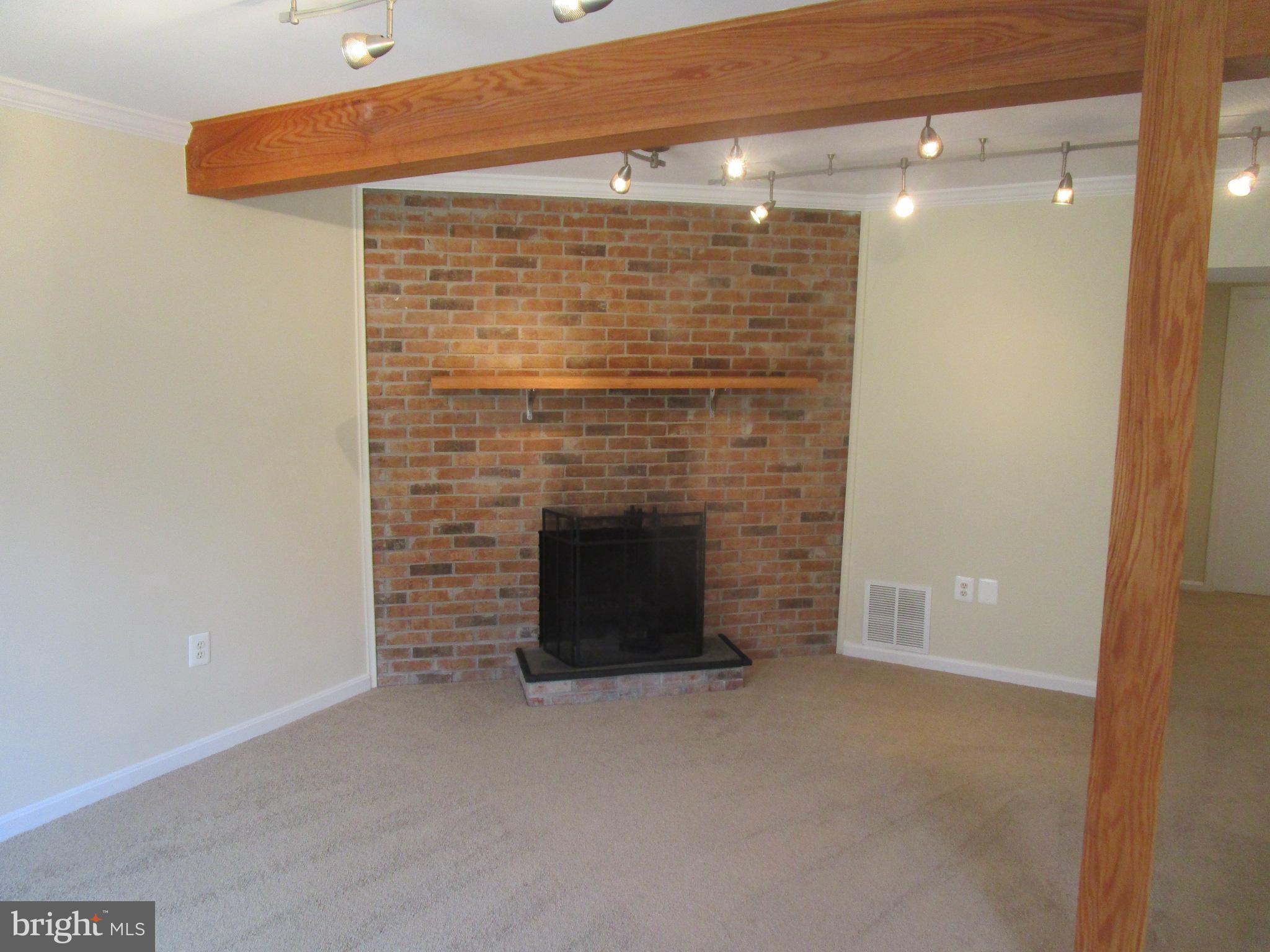7932 Forest Path Way Springfield, VA 22153 - Photo 23 of 30 Family room Beamed Ceiling