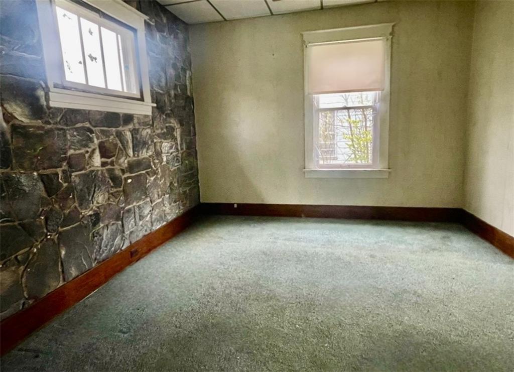 2409 25th Street Beaver Falls, PA 15010 - Photo 11 of 20 an empty room with windows