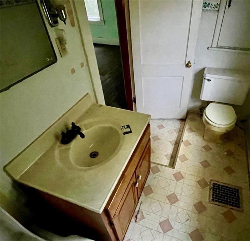 2409 25th Street Beaver Falls, PA 15010 - Photo 16 of 20 a bathroom with a sink and a toilet