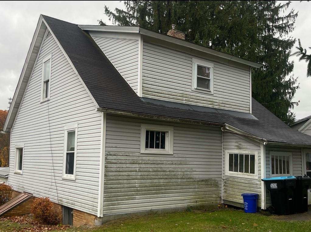 2409 25th Street Beaver Falls, PA 15010 - Photo 4 of 20 a view of a house with a backyard