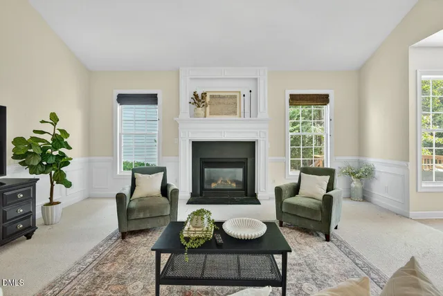 a spacious bedroom with a bed and a couch