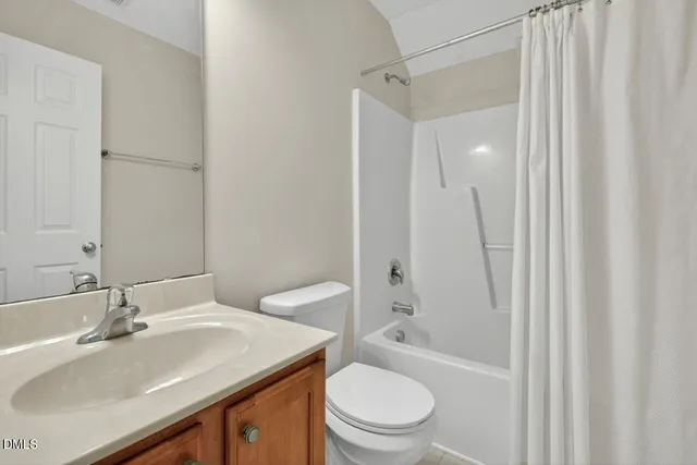 a view of a two chairs and a tables in the patio