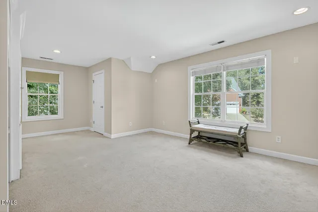 a view of a two chairs in the deck