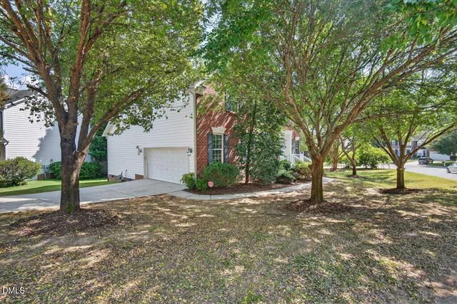 an aerial view of a house with a garden