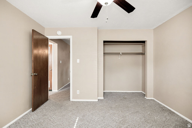 240 East 400 North, Unit 26 Logan, UT 84321 - Photo 6 of 12 Room with textured grey carpeting and light neutral wall paint