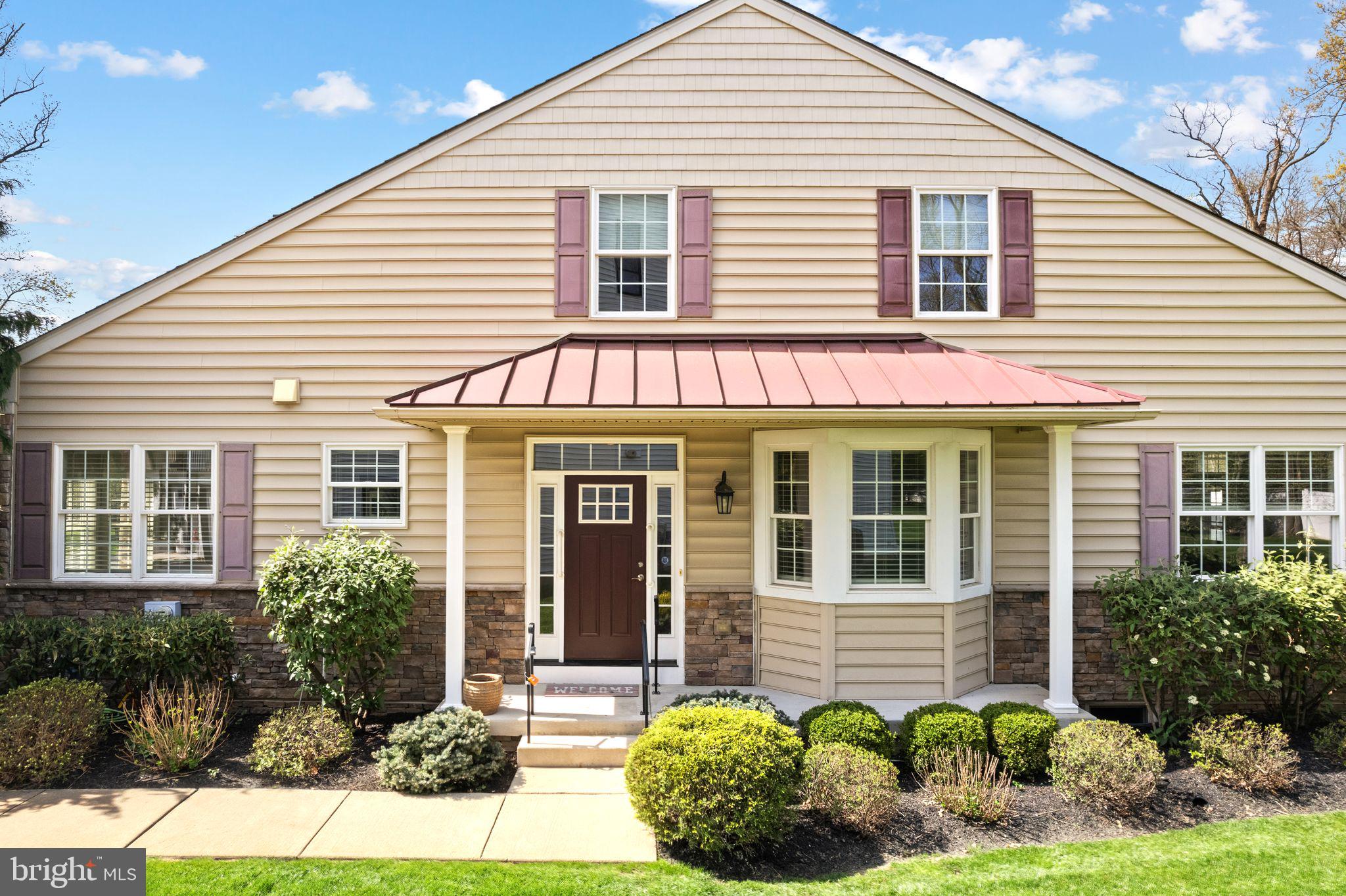 Charming home with inviting entrance.