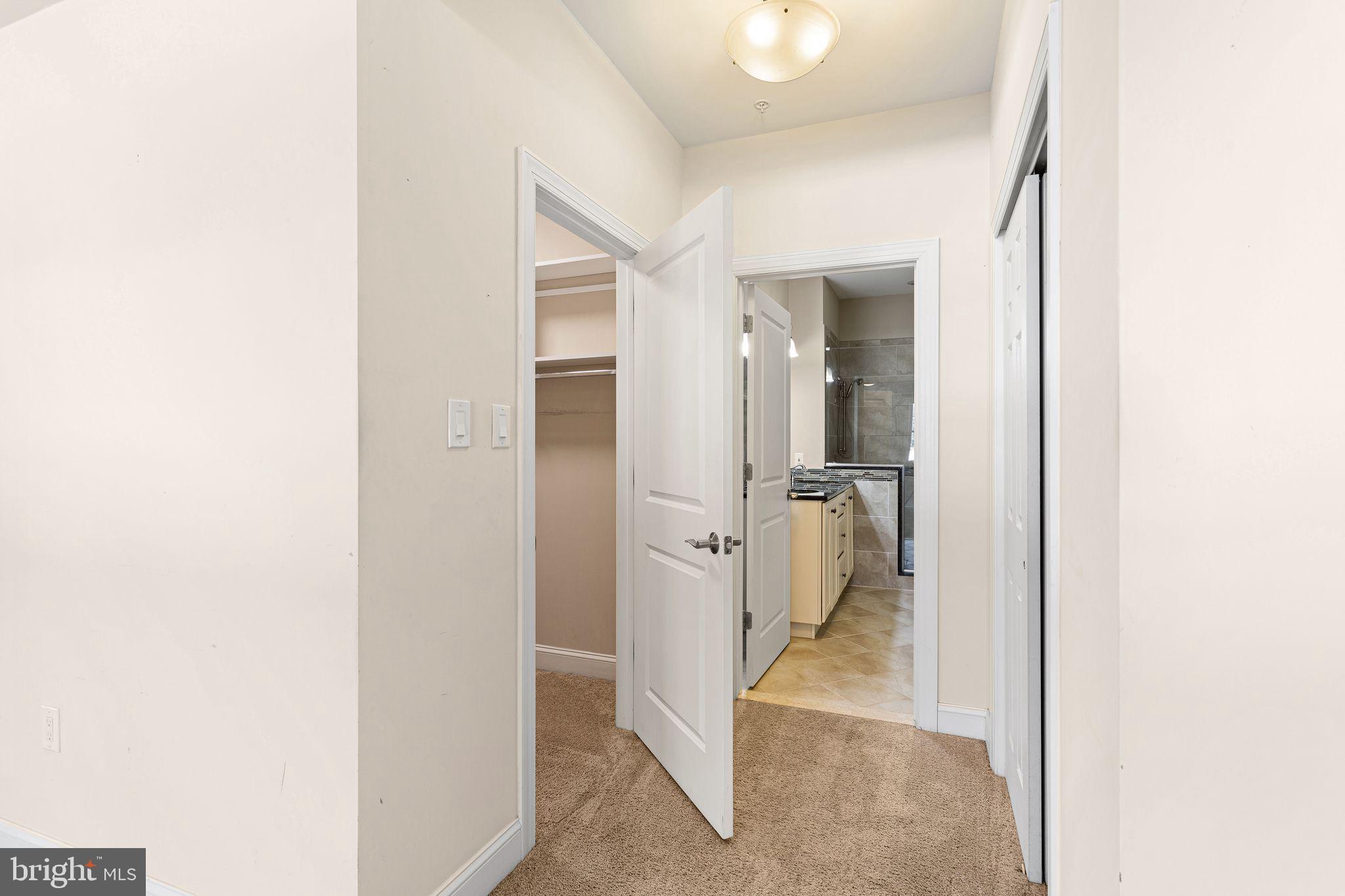 587 East Township Line Road, Unit 1 Blue Bell, PA 19422 - Photo 16 of 33 Inviting hallway with modern touches.