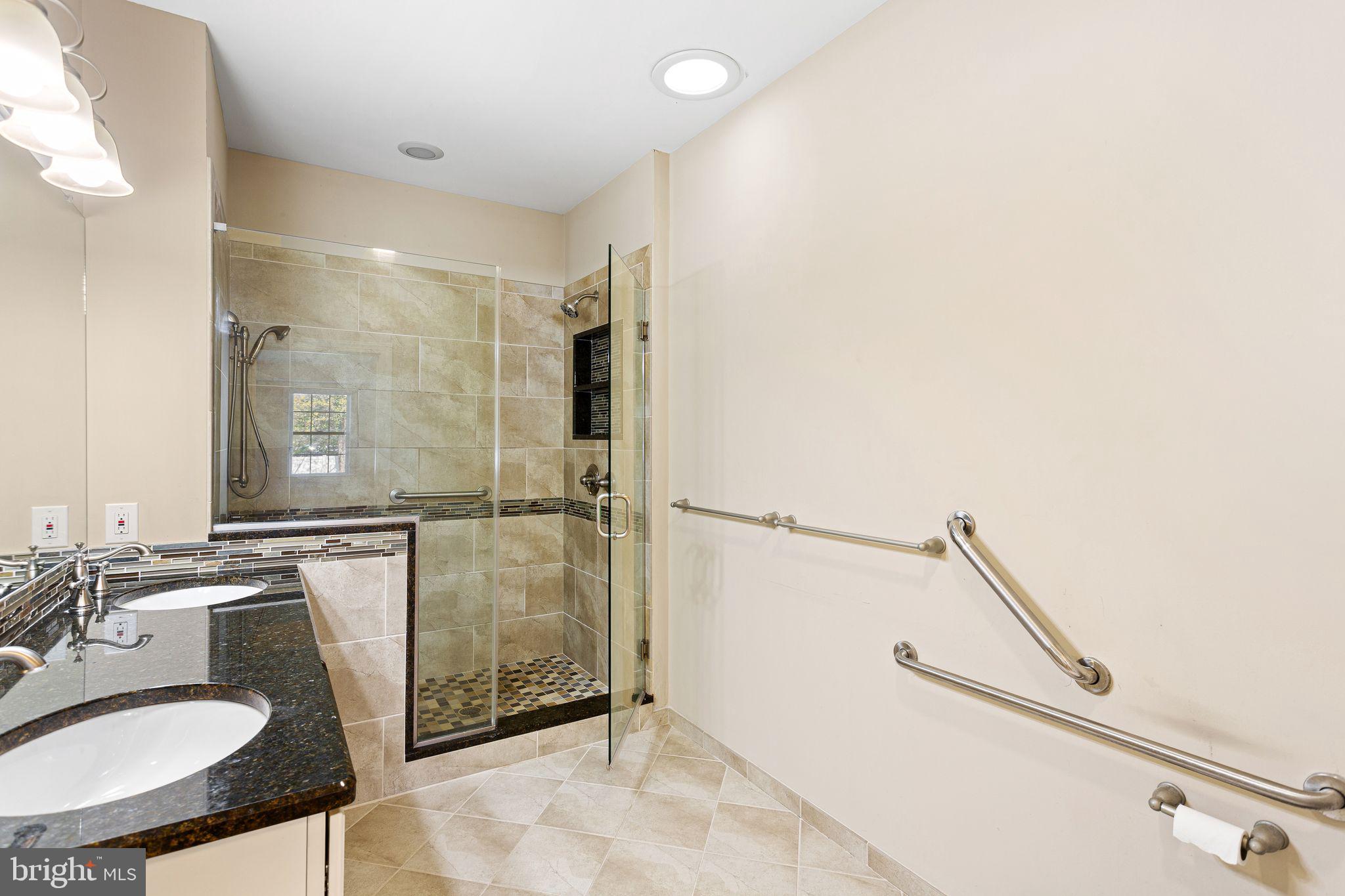 587 East Township Line Road, Unit 1 Blue Bell, PA 19422 - Photo 18 of 33 Elegant, accessible bathroom retreat.