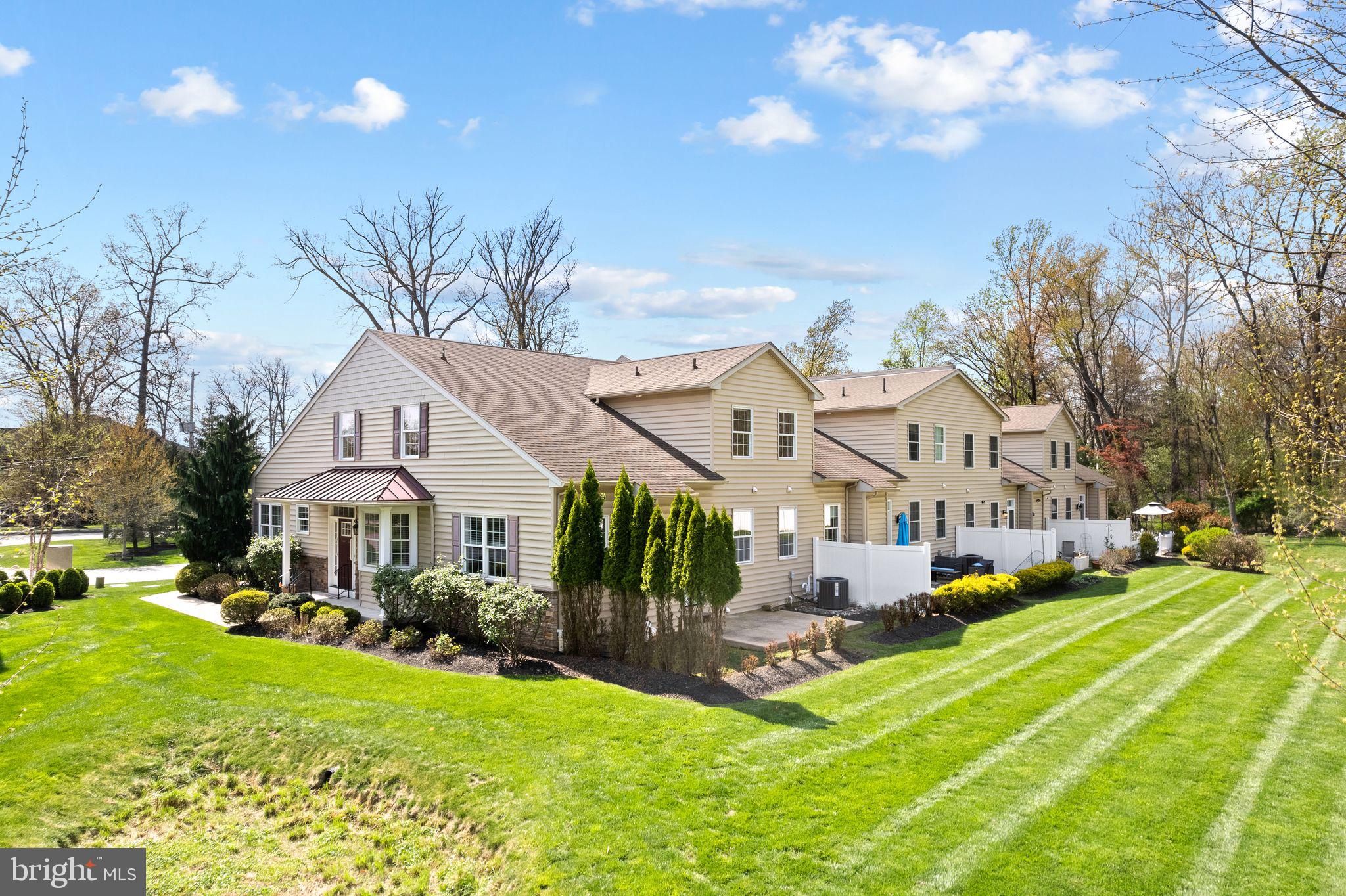 587 East Township Line Road, Unit 1 Blue Bell, PA 19422 - Photo 30 of 33 Charming home with lush green lawns.