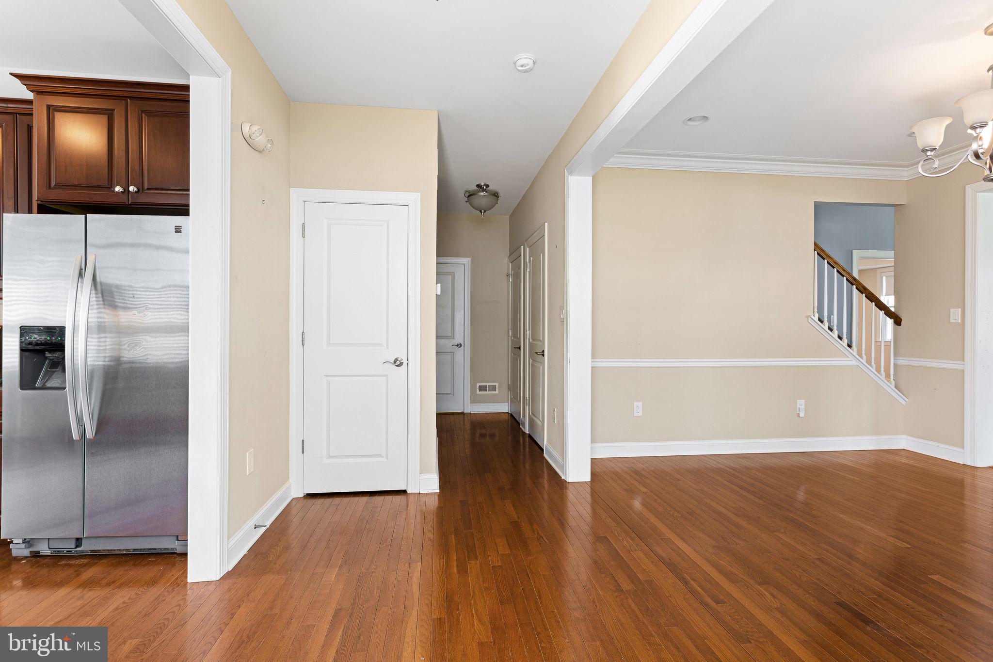587 East Township Line Road, Unit 1 Blue Bell, PA 19422 - Photo 6 of 33 Spacious entryway with warm tones.