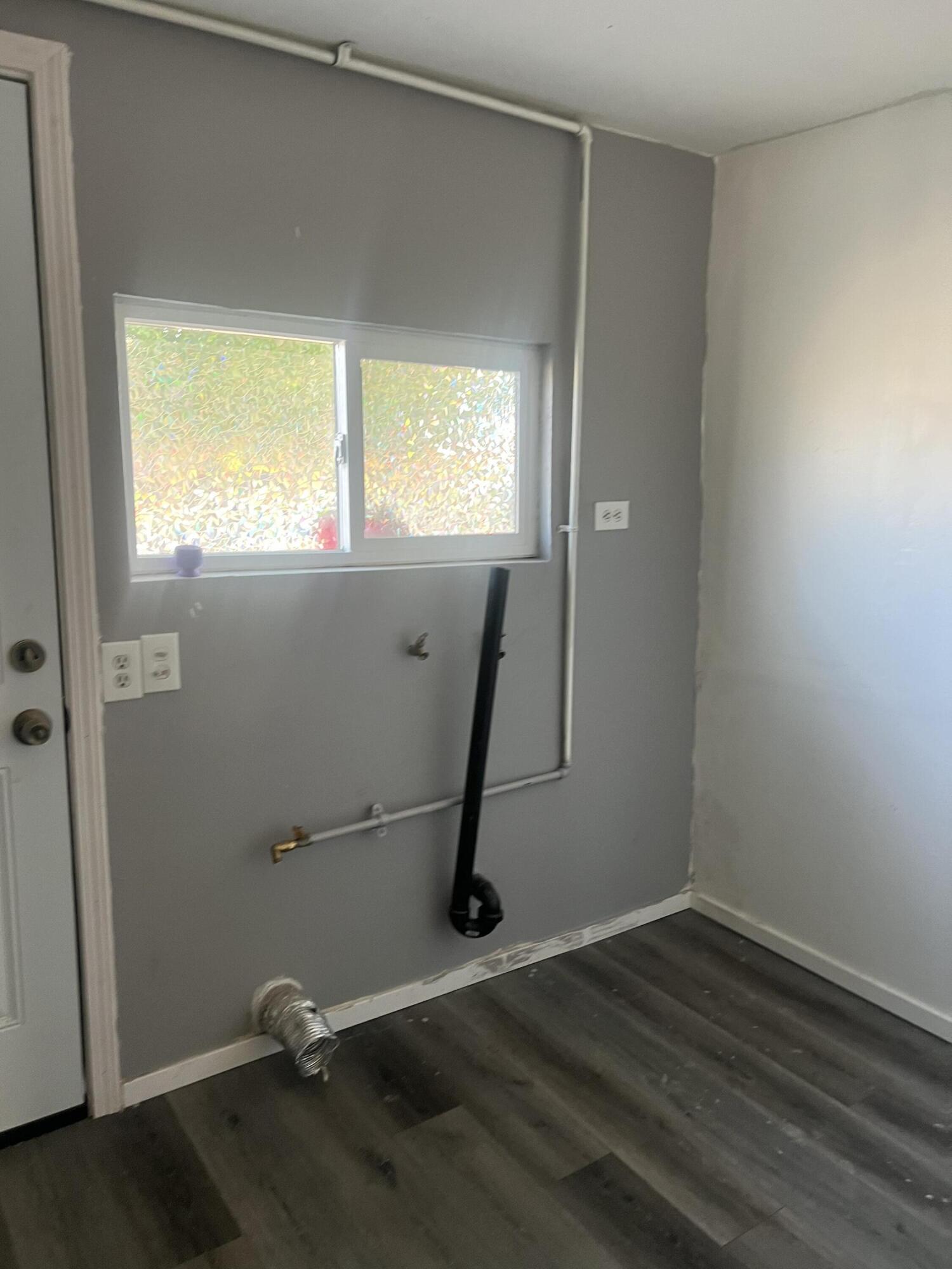 47902 Luzon Street Indio, CA 92201 - Photo 6 of 11 a view of a room with wooden floor and a window