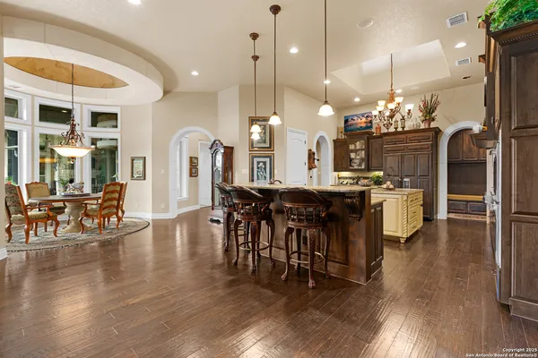 a kitchen with a sink cabinets and window
