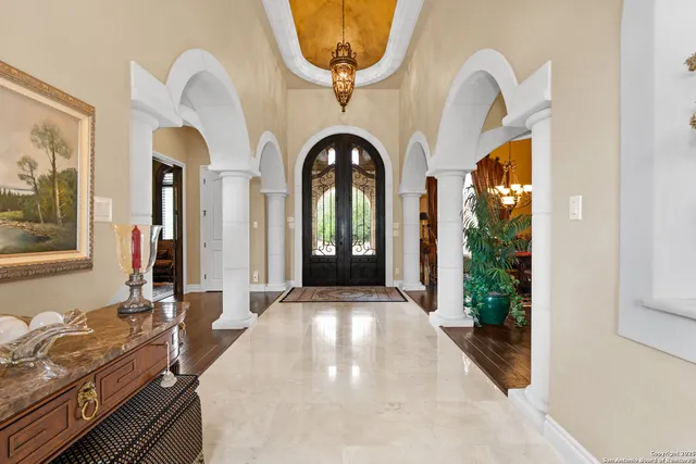 a large kitchen with a table and chairs