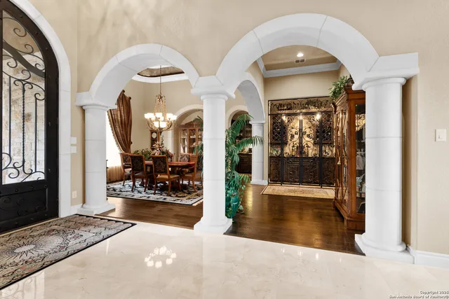 a kitchen with stainless steel appliances granite countertop a stove and a refrigerator