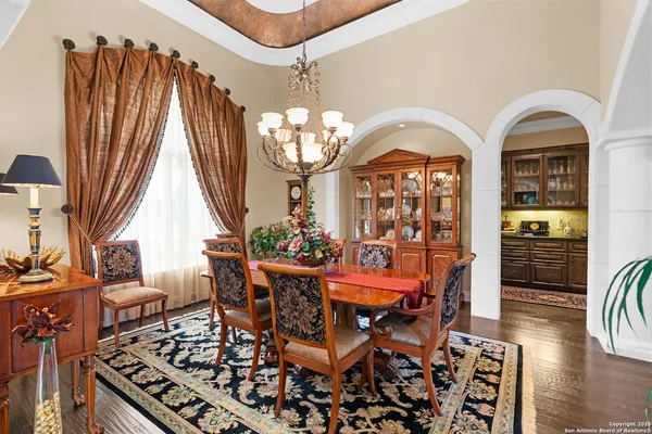 a kitchen with stainless steel appliances granite countertop a sink and cabinets