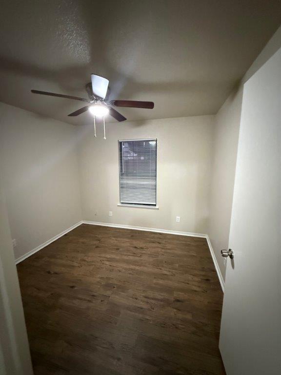 1405 East Cypress Avenue Reedley, CA 93654 - Photo 11 of 29 a view of an empty room with a chandelier fan