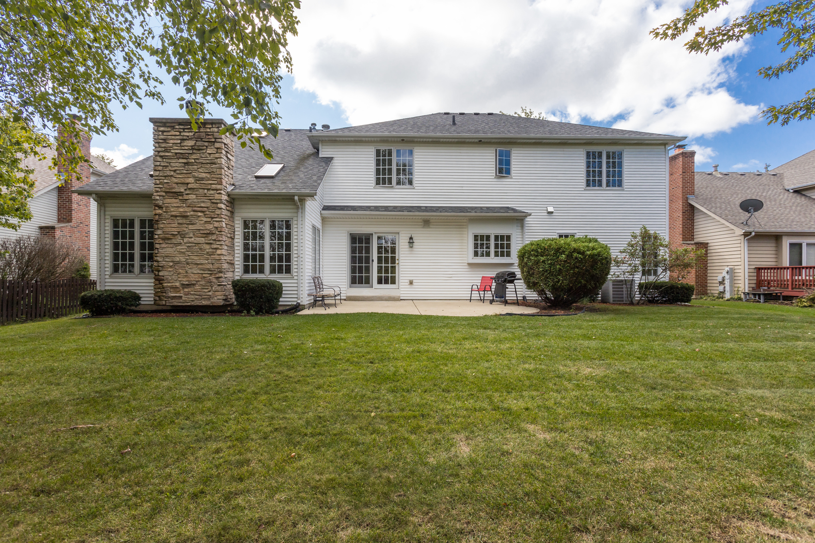 3819 Grassmere Road Naperville, IL 60564 - Photo 3 of 38 a front view of house with yard and green space