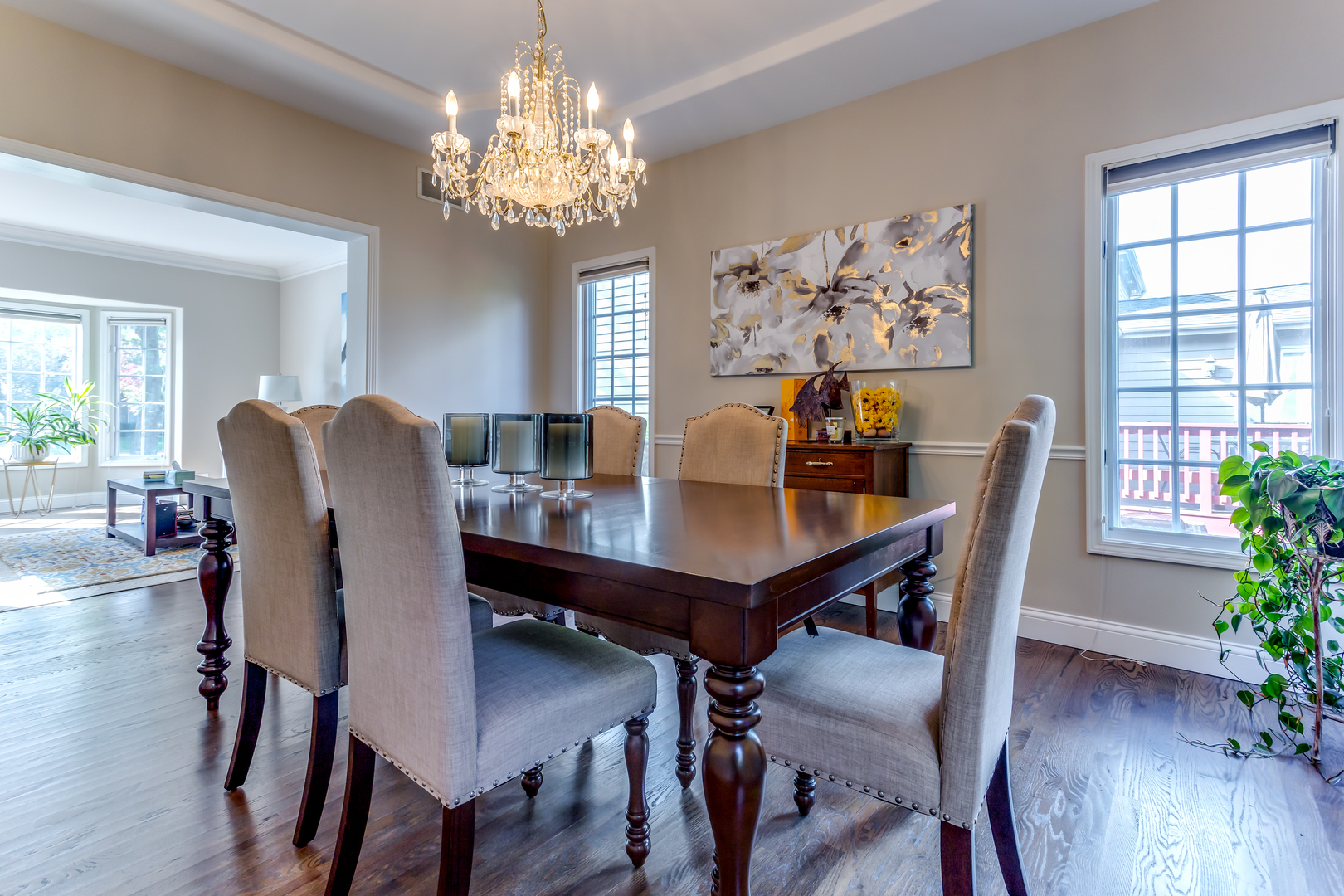 3819 Grassmere Road Naperville, IL 60564 - Photo 7 of 38 a view of a dining room with furniture wooden floor and chandelier