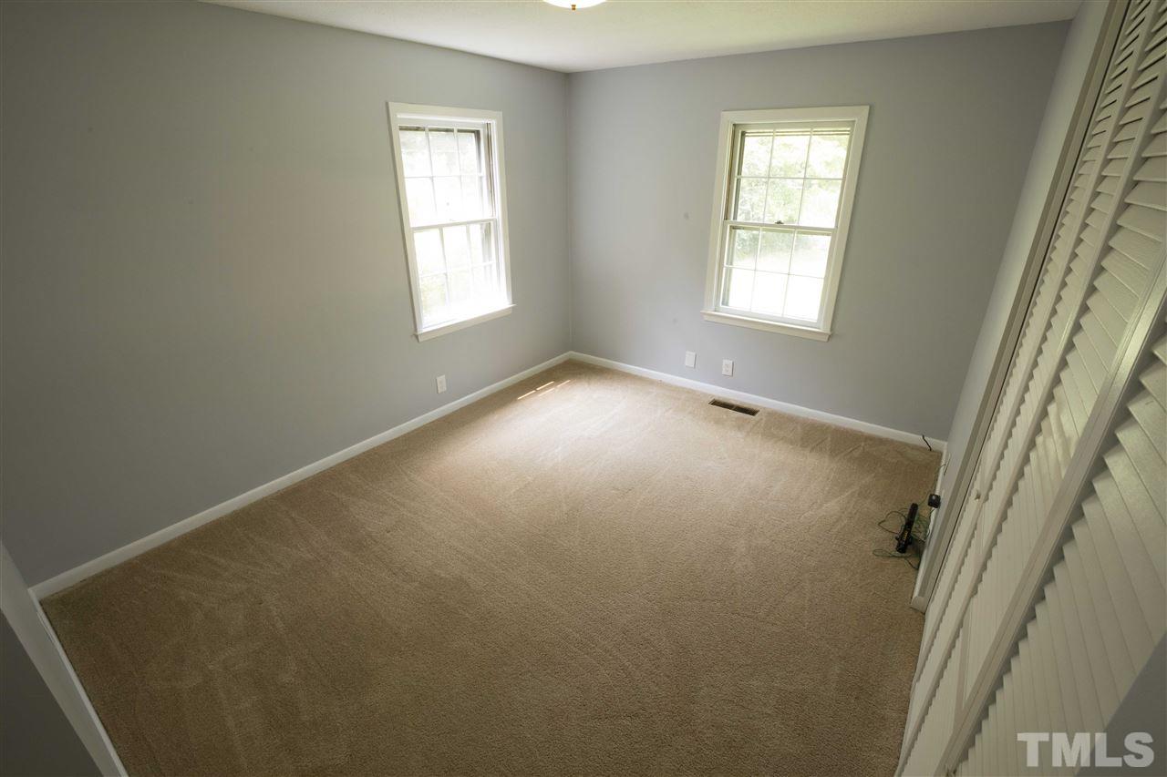 2708 Ramsey Road Raleigh, NC 27604 - Photo 15 of 21 an empty room with windows