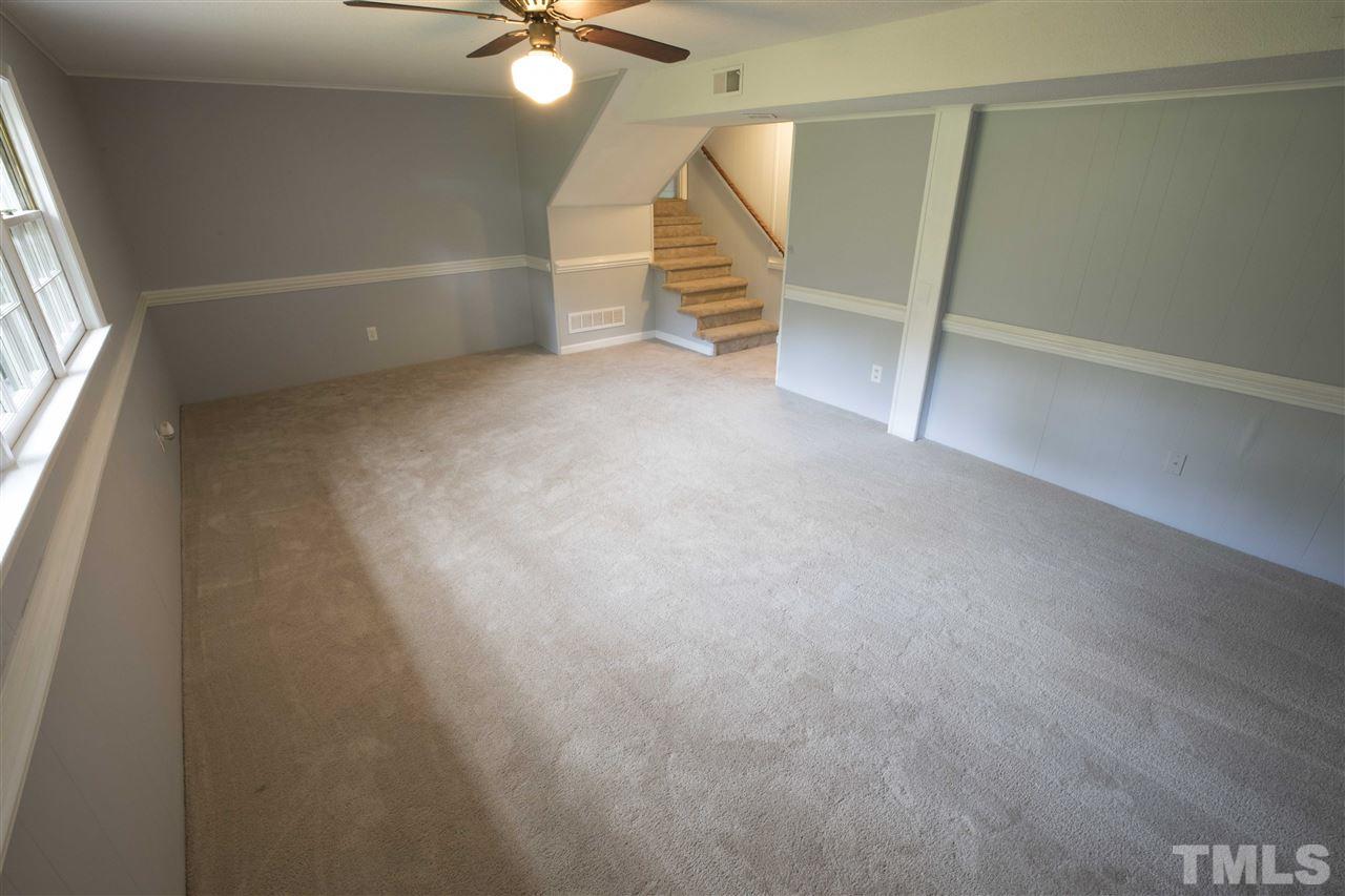 2708 Ramsey Road Raleigh, NC 27604 - Photo 18 of 21 an empty room with windows