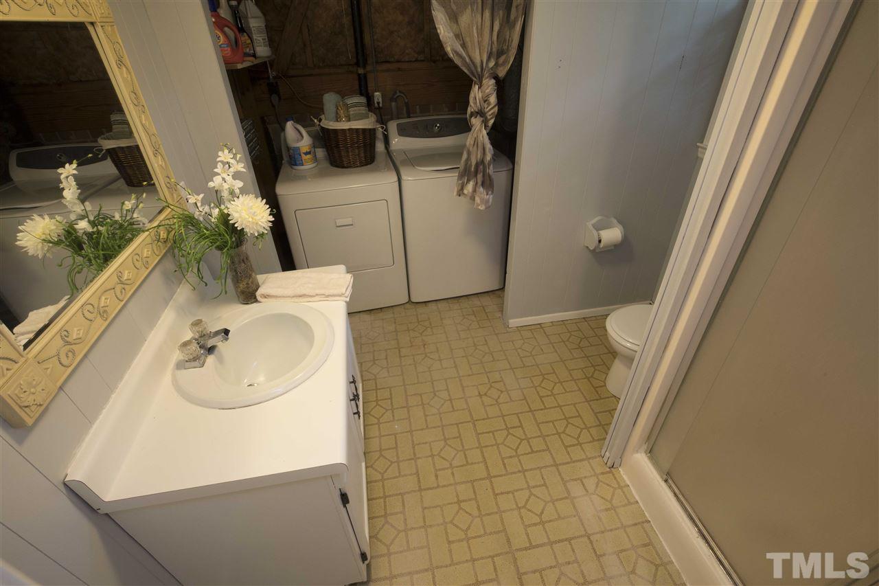 2708 Ramsey Road Raleigh, NC 27604 - Photo 20 of 21 a bathroom with a sink and toilet