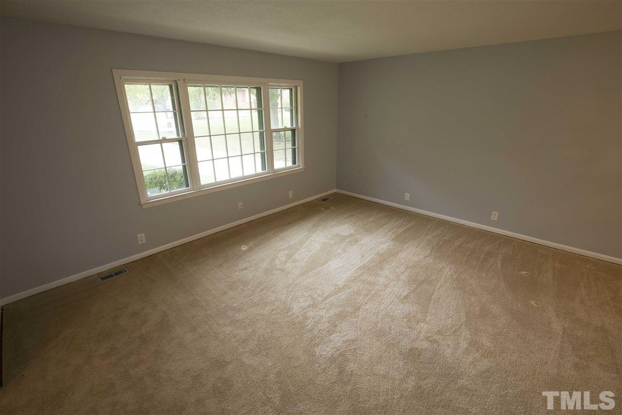 2708 Ramsey Road Raleigh, NC 27604 - Photo 4 of 21 an empty room with a window