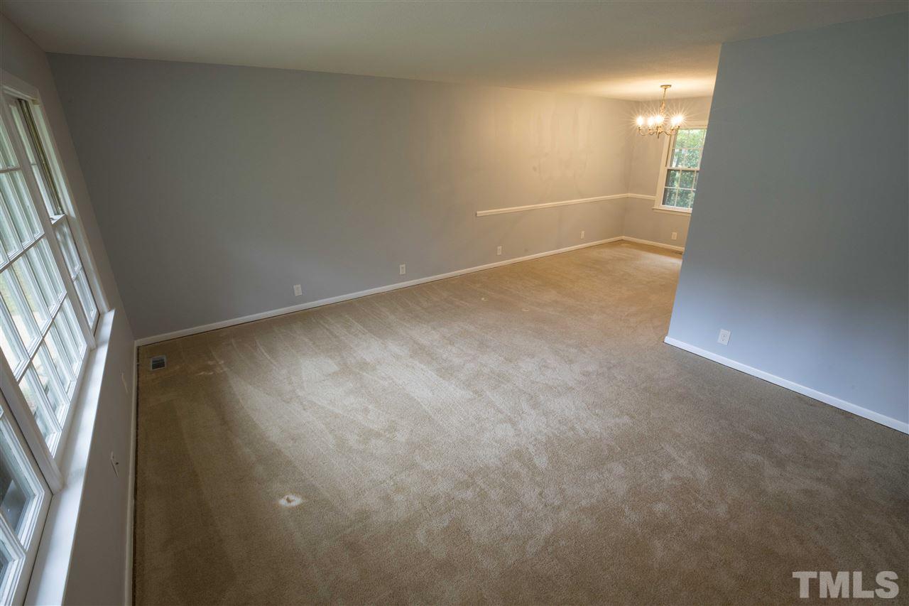 2708 Ramsey Road Raleigh, NC 27604 - Photo 5 of 21 an empty room with windows