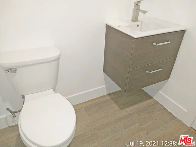 a bathroom with a toilet and a sink