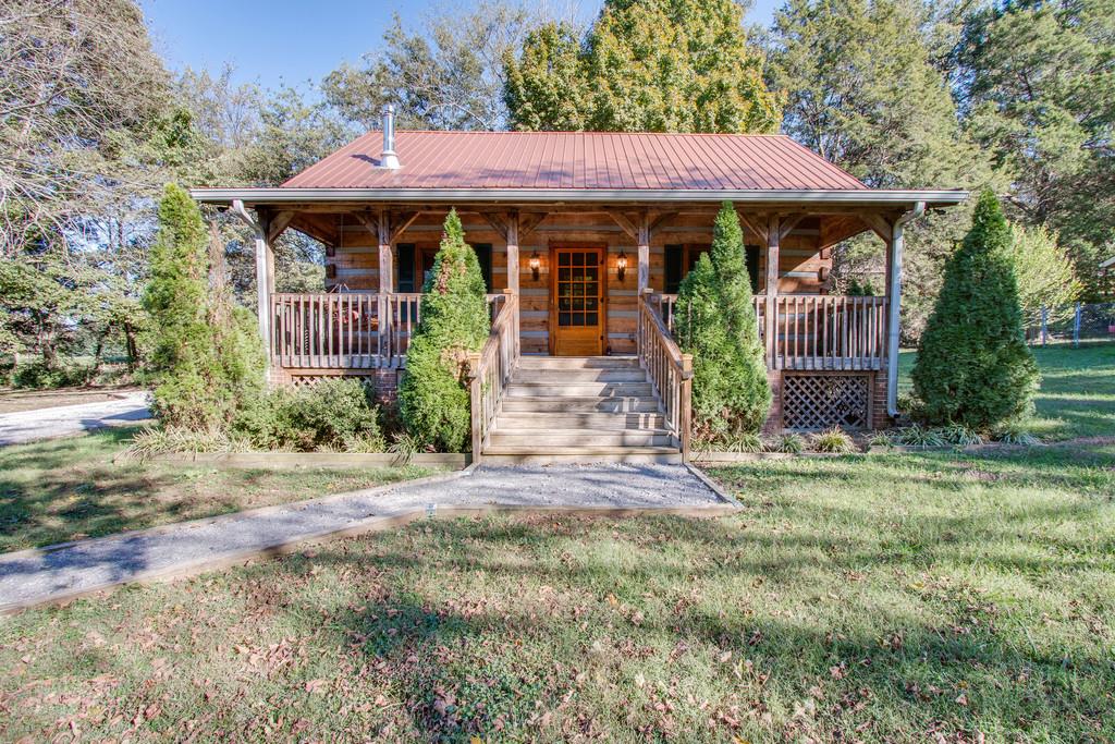 5534 Vanderbilt Road Old Hickory, TN 37138 - Photo 1 of 27 a front view of a house with garden