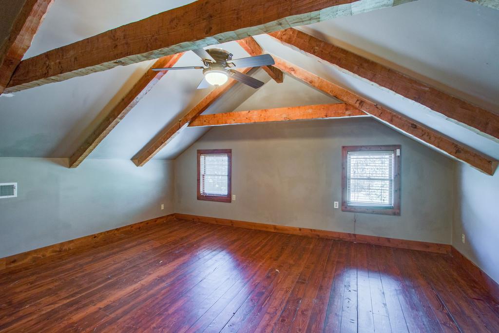 5534 Vanderbilt Road Old Hickory, TN 37138 - Photo 18 of 27 a view of an empty room with wooden floor and a window