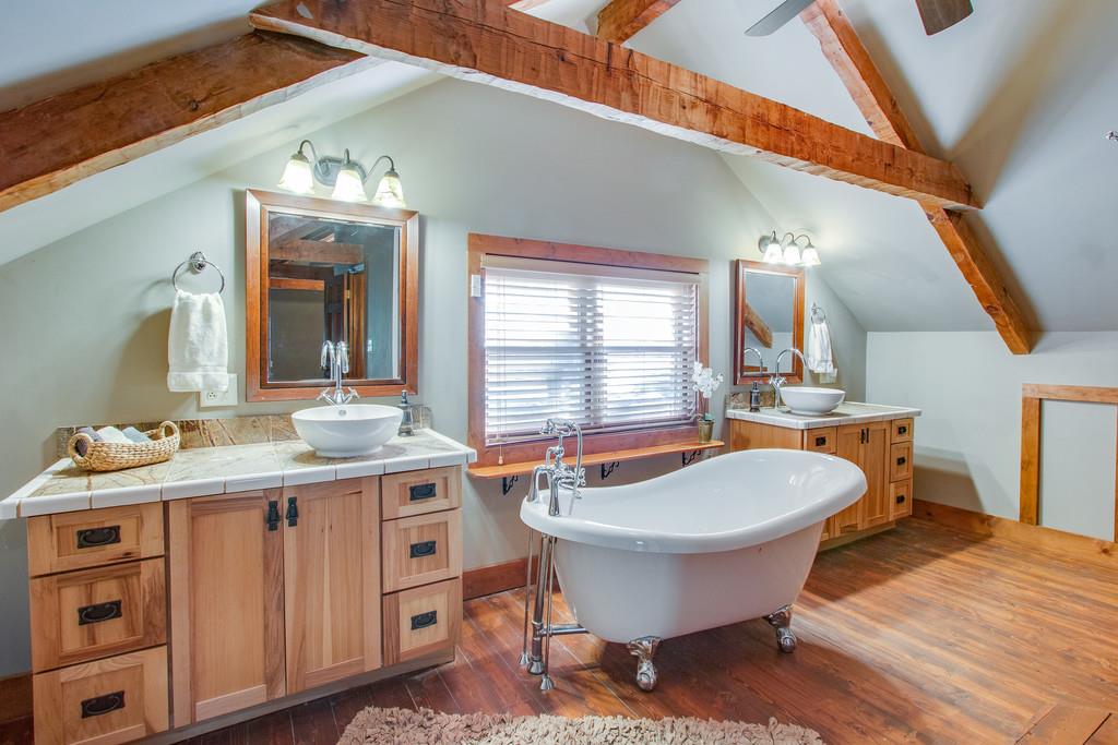 5534 Vanderbilt Road Old Hickory, TN 37138 - Photo 21 of 27 a bathroom with a granite countertop sink and a mirror