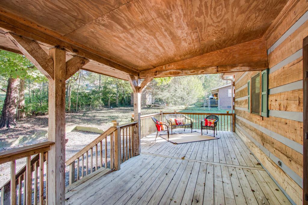 5534 Vanderbilt Road Old Hickory, TN 37138 - Photo 22 of 27 a balcony with wooden floor and outdoor seating