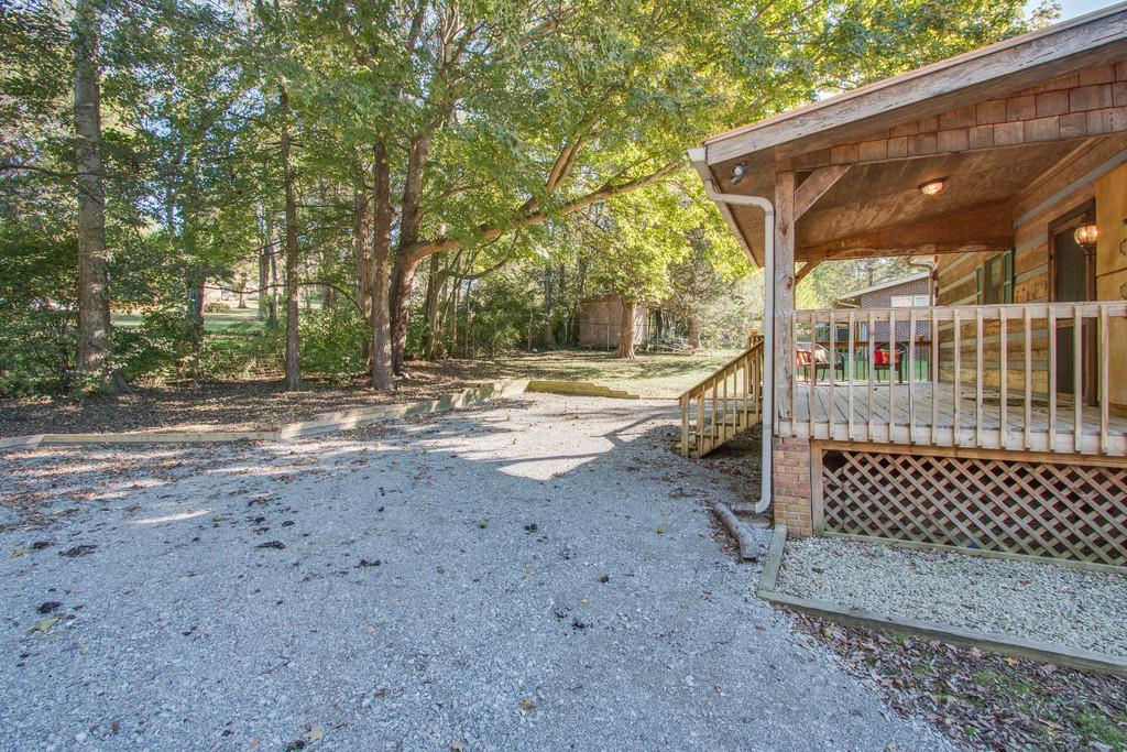 5534 Vanderbilt Road Old Hickory, TN 37138 - Photo 26 of 27 a view of a yard with wooden fence