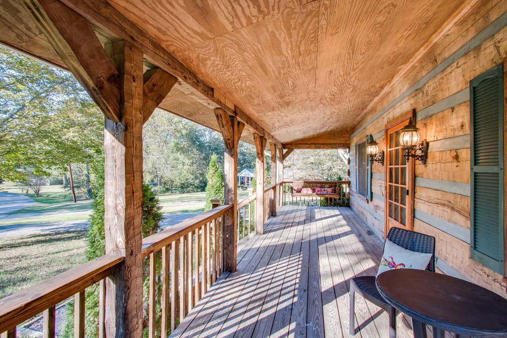 5534 Vanderbilt Road Old Hickory, TN 37138 - Photo 4 of 27 a view of a chairs and table in the balcony