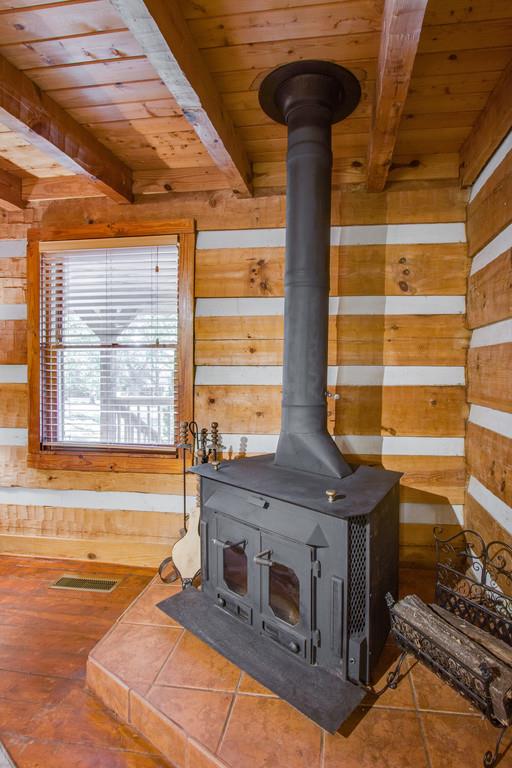 5534 Vanderbilt Road Old Hickory, TN 37138 - Photo 7 of 27 a kitchen with stainless steel appliances granite countertop a stove and a window