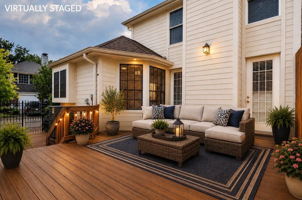 12929 Kingsbridge Lane Houston, TX 77077 - Photo 36 of 42 Spacious backyard deck with freshly updated siding and a beautifully refinished wood deck, perfect for outdoor entertaining and relaxing. Virtually staged with stylish patio furniture, cozy seating area, decorative lighting, and lush greenery to showcase the home’s potential. Enjoy a private outdoor living space ideal for gatherings, morning coffee, or evening unwinding. Large windows provide natural light and a seamless indoor-outdoor feel buyers love.