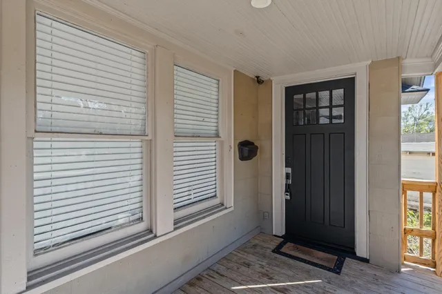 a view of a room that has a window in it