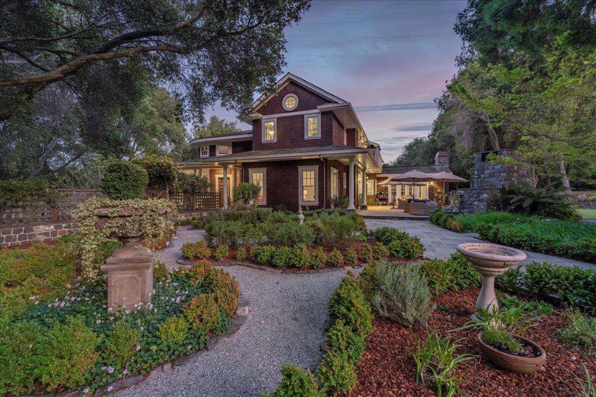 3510 Alpine Road Portola Valley, CA 94028 - Photo 55 of 77 a front view of a house with a yard and fountain