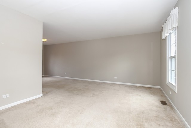 2784 Randall Ridge Drive Elgin, IL 60124 - Photo 2 of 20 an empty room with a empty space and a window