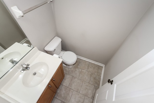 2784 Randall Ridge Drive Elgin, IL 60124 - Photo 12 of 20 a bathroom with a sink and mirror with toilet