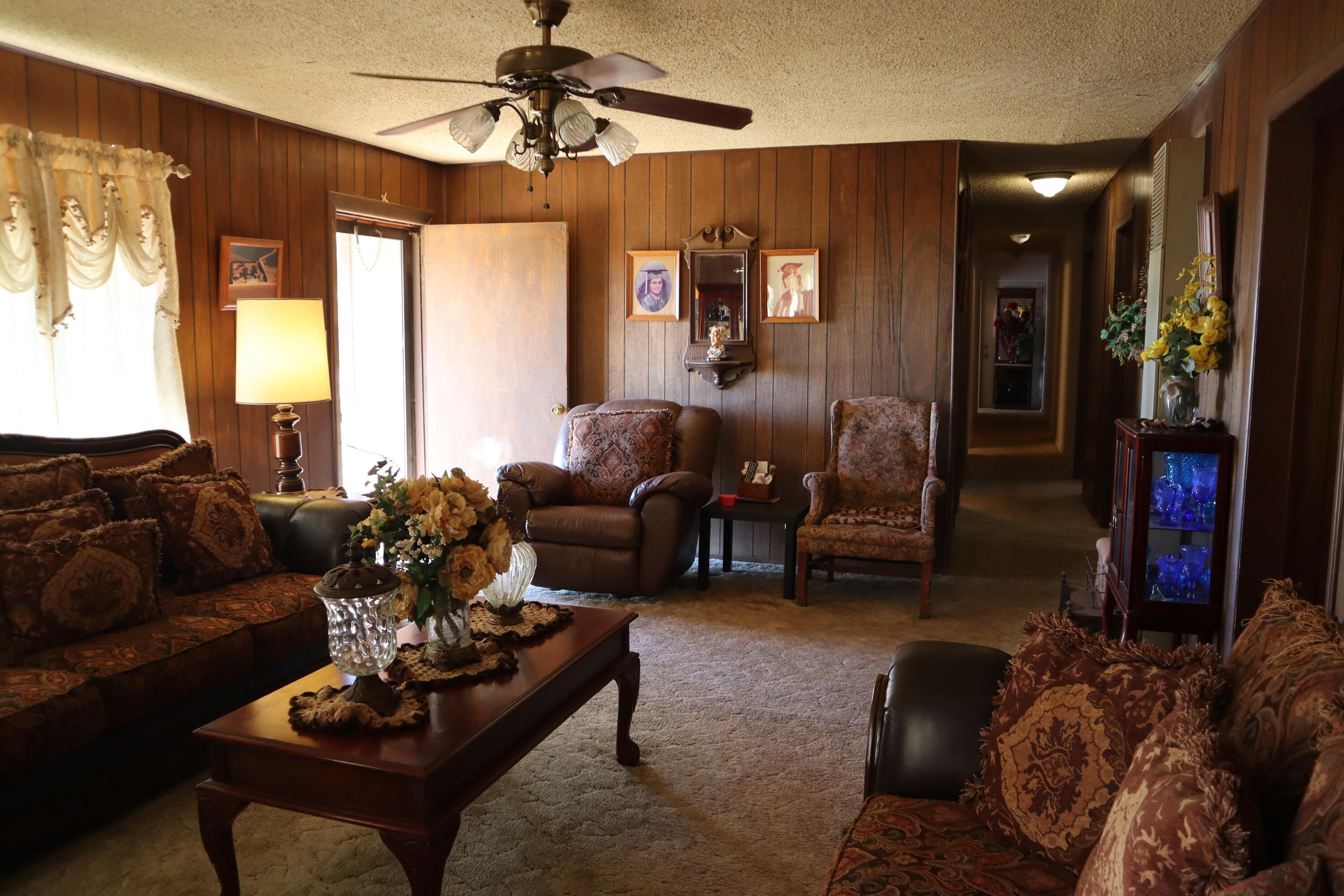 5993 Jaguar Road Levelland, TX 79336 - Photo 4 of 24 a living room with furniture and a large window