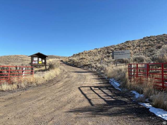 2687 East Henefer Road, Unit 1 Henefer, UT 84033 - Photo 8 of 11 View of dirt / gravel road with a gated entry