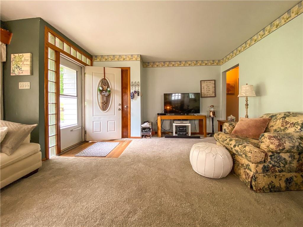 145 Stuber Road New Brighton, PA 15066 - Photo 11 of 27 a living room with furniture and a flat screen tv