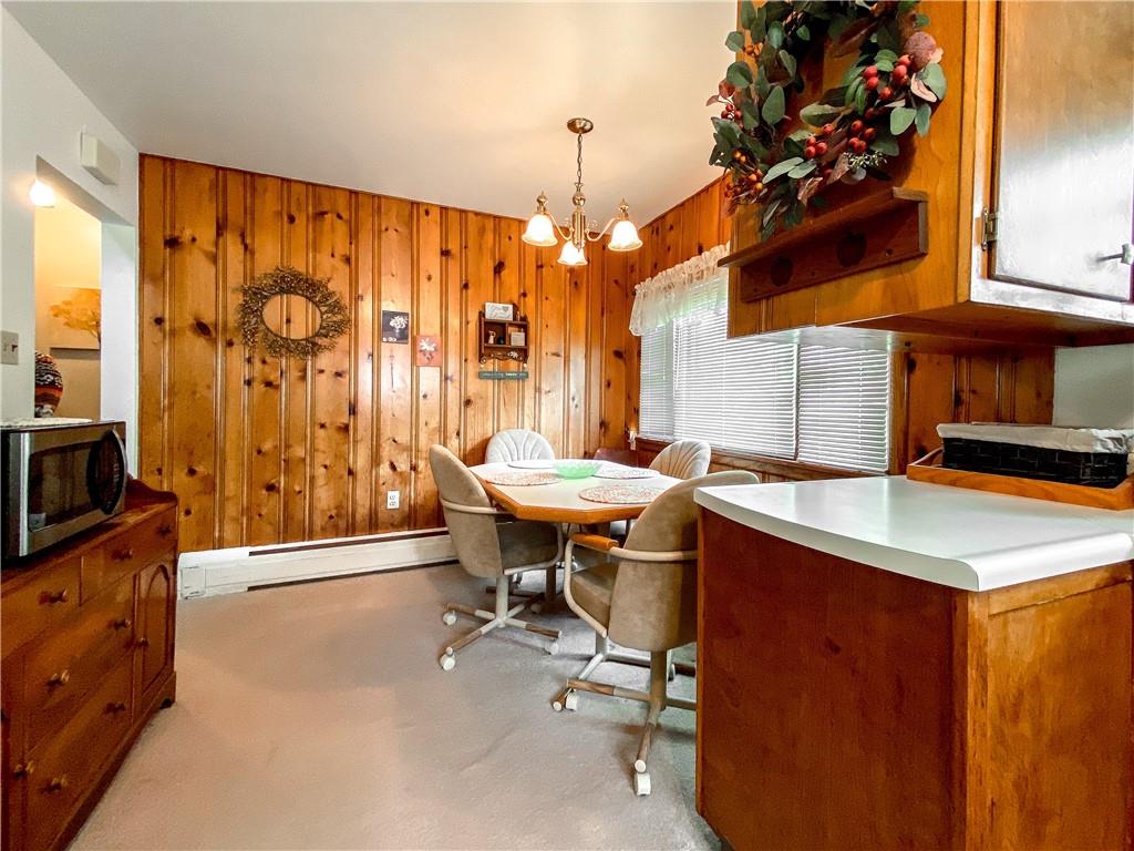 145 Stuber Road New Brighton, PA 15066 - Photo 14 of 27 a view of a room with a table and chairs