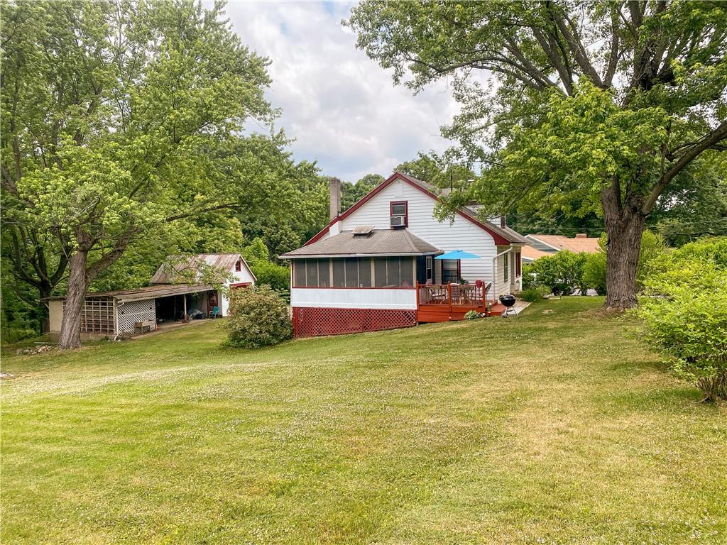 145 Stuber Road New Brighton, PA 15066 - Photo 6 of 27 a front view of a house with yard and green space