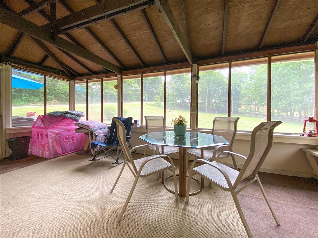 145 Stuber Road New Brighton, PA 15066 - Photo 10 of 27 a dining room with furniture and a floor to ceiling window