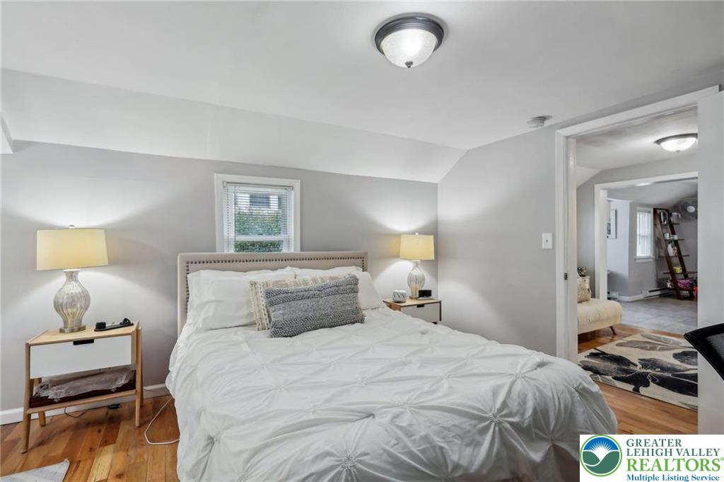 3203 Washington Street Bethlehem, PA 18020 - Photo 11 of 14 a bedroom with a bed and a lamp