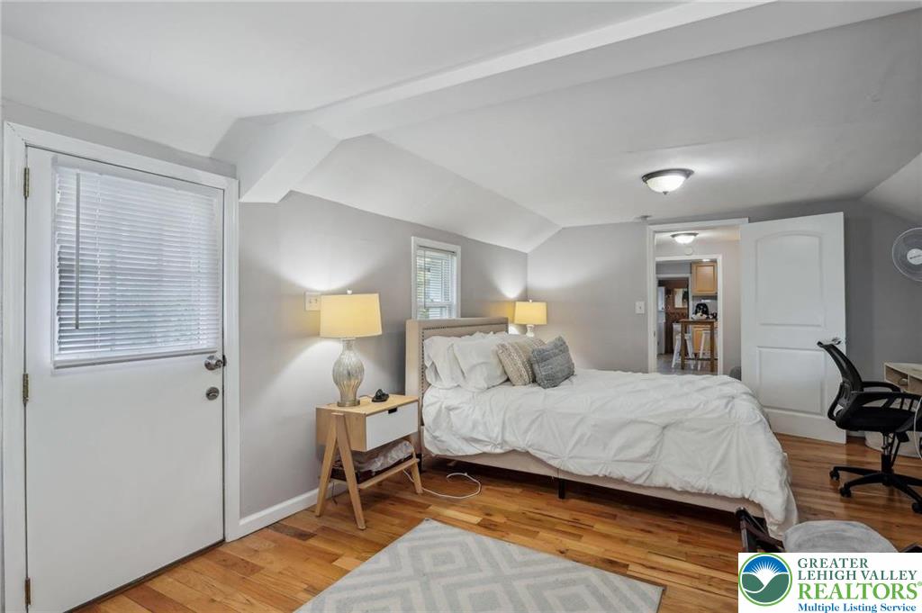 3203 Washington Street Bethlehem, PA 18020 - Photo 13 of 14 a bedroom with a bed and wooden floor