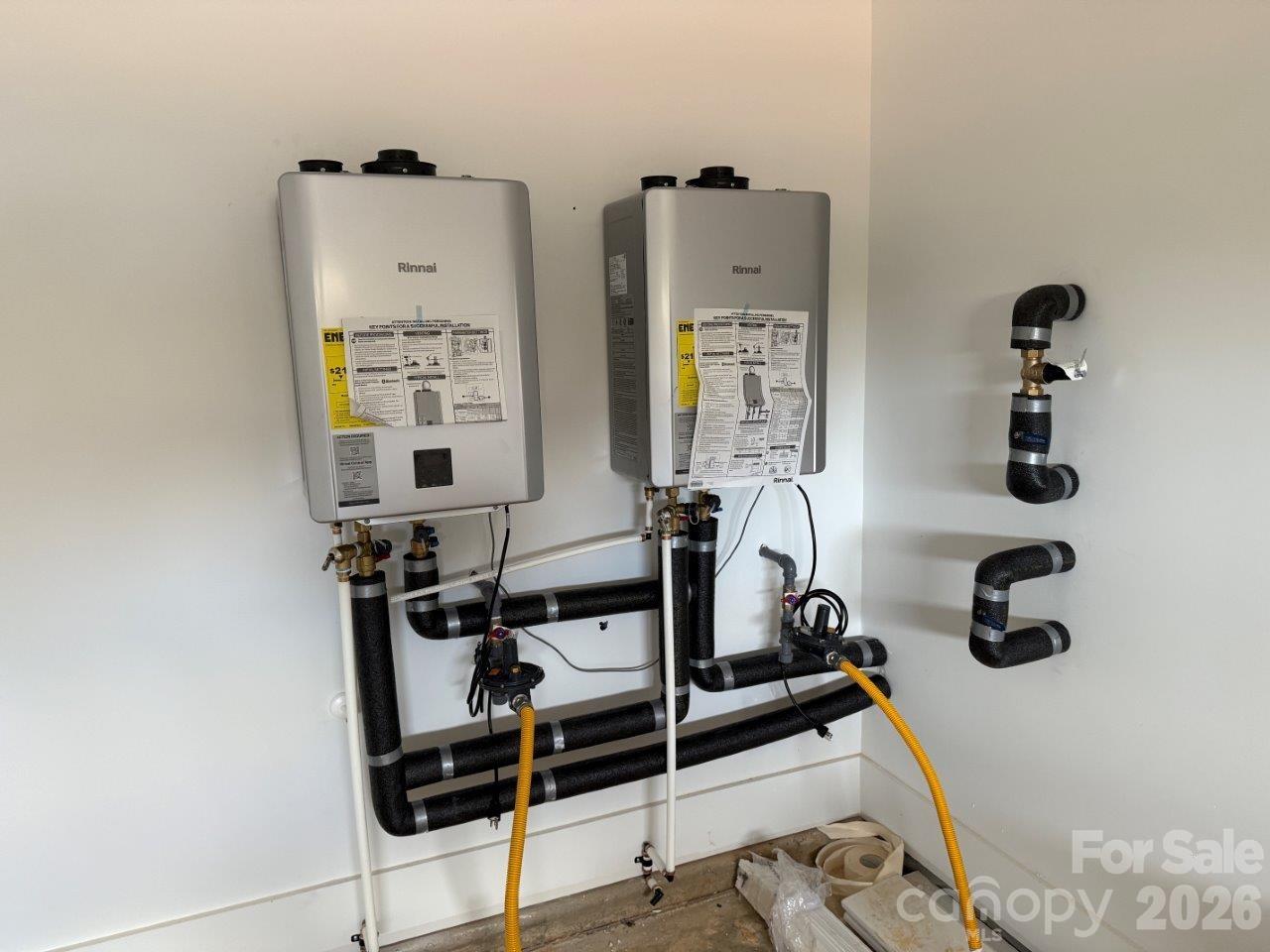 1027 Cox Road, Unit 12 Weddington, NC 28104 - Photo 30 of 32 a room with gym equipment and view of living room